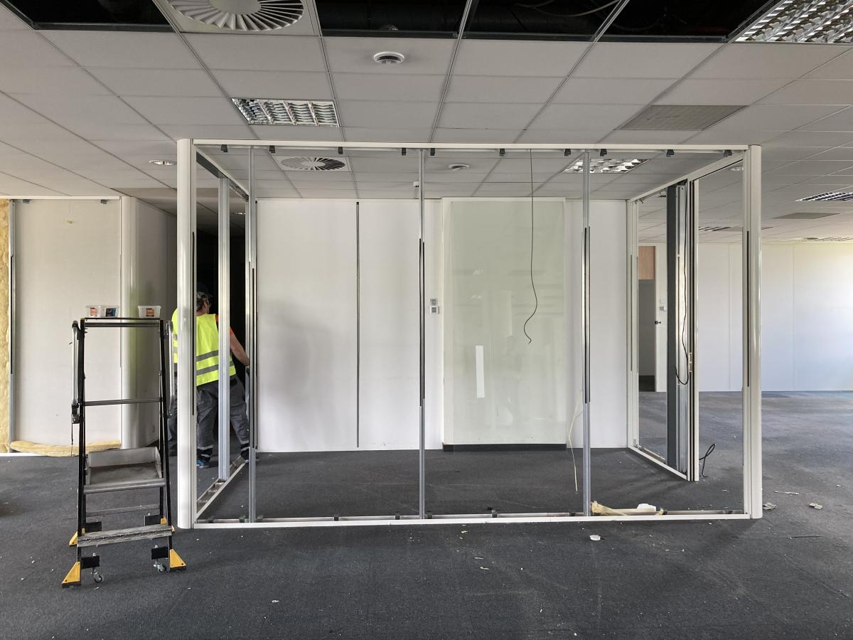 Office partitions being harvested as a part of the French Demonstrator work in Paris, France