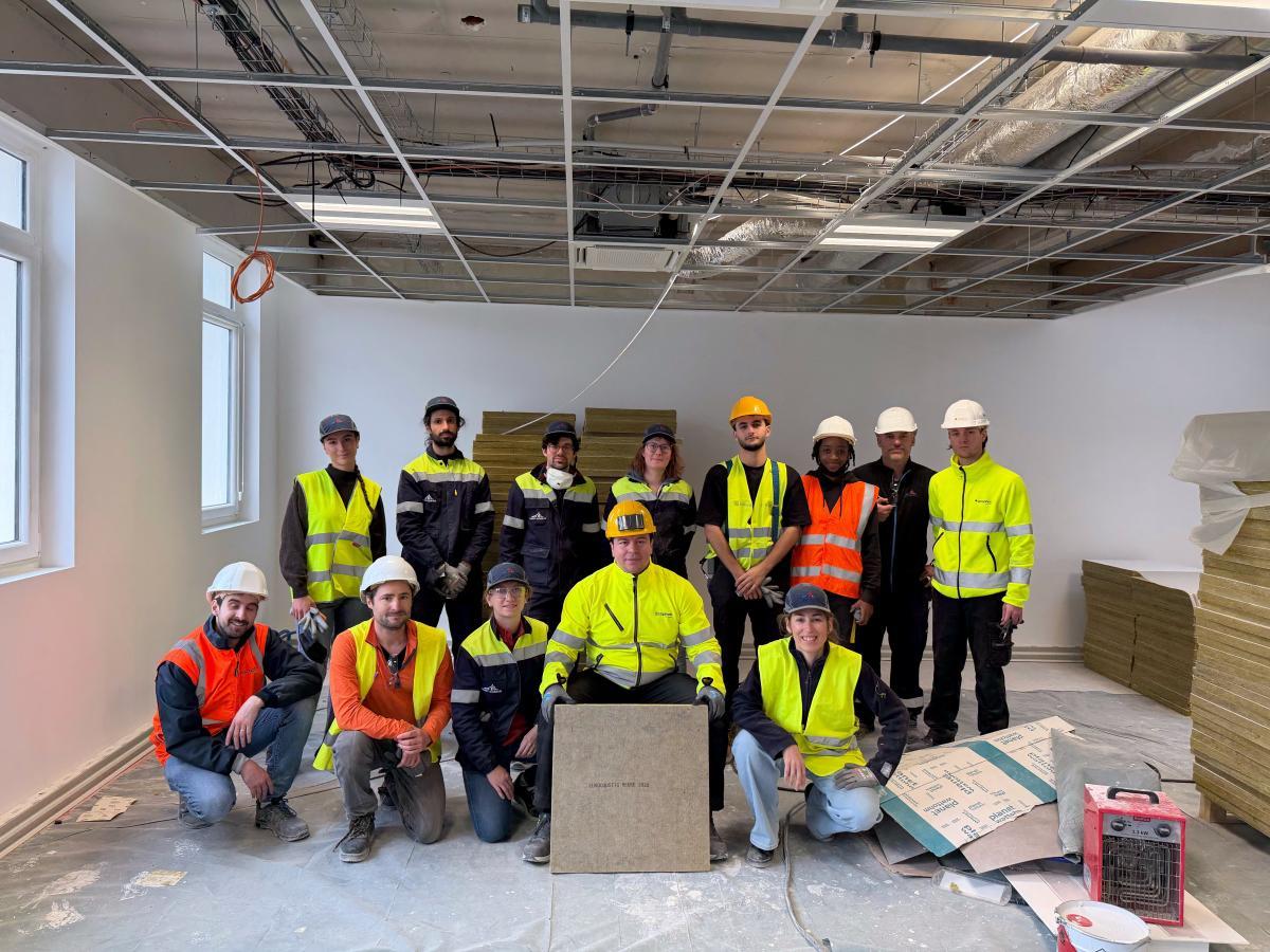 The French Demonstrator ceiling tile installation team in Aubervilliers, France.